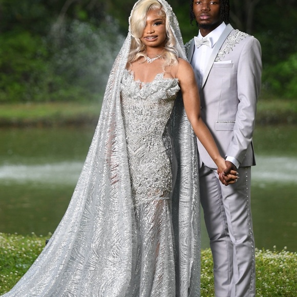 Elegant Silver Gown with Cape